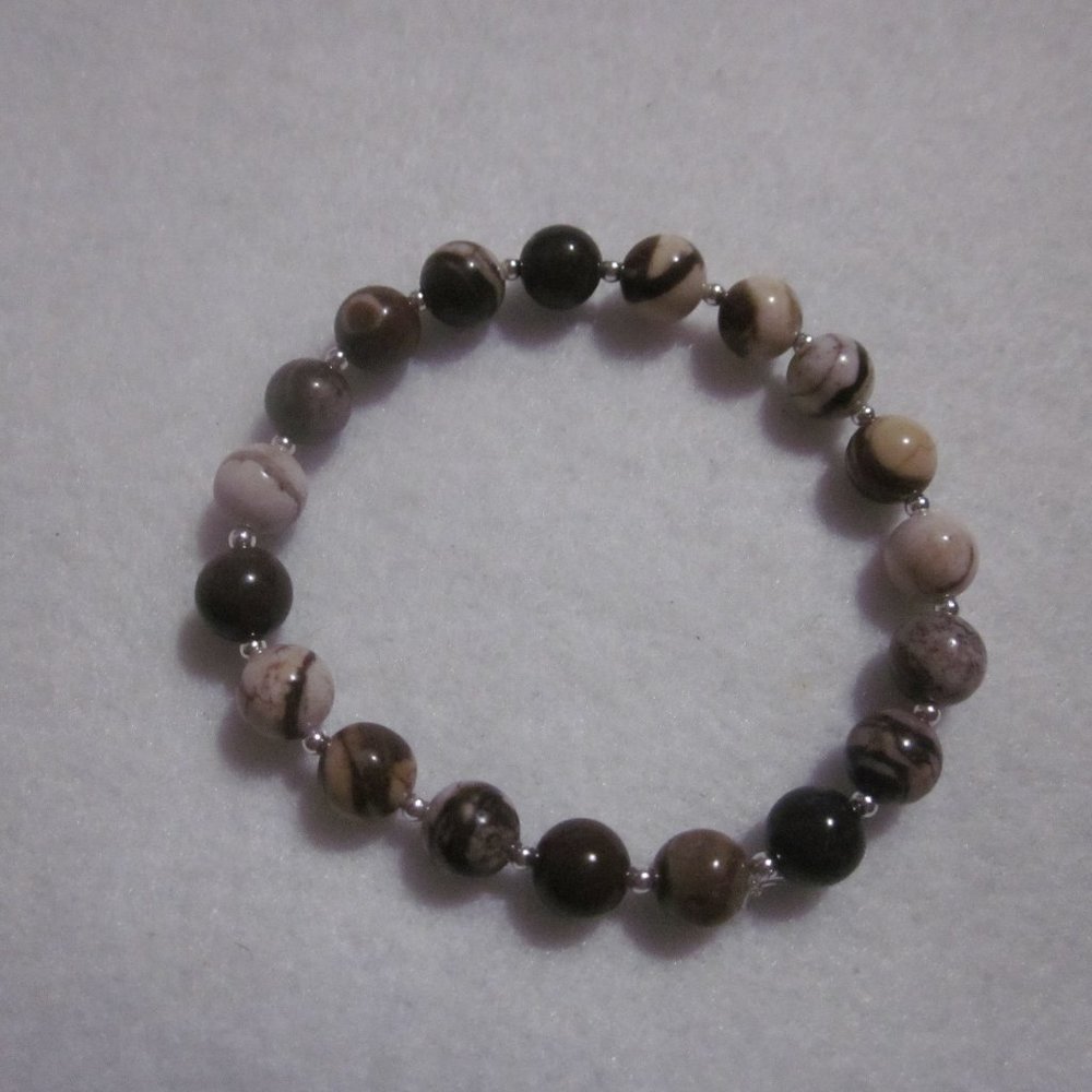 Brown and Cream Swirl Beaded Stretch Bracelet.